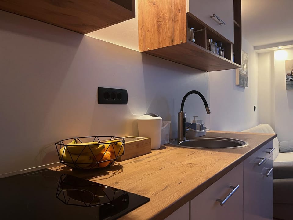 Kitchen or kitchenette, stove