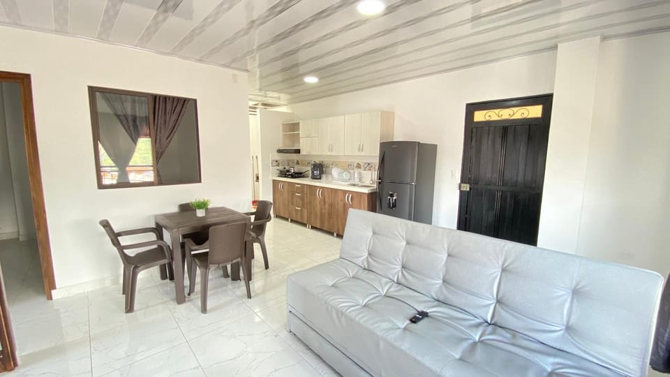 Kitchen or kitchenette, Living room, Seating area, Dining area