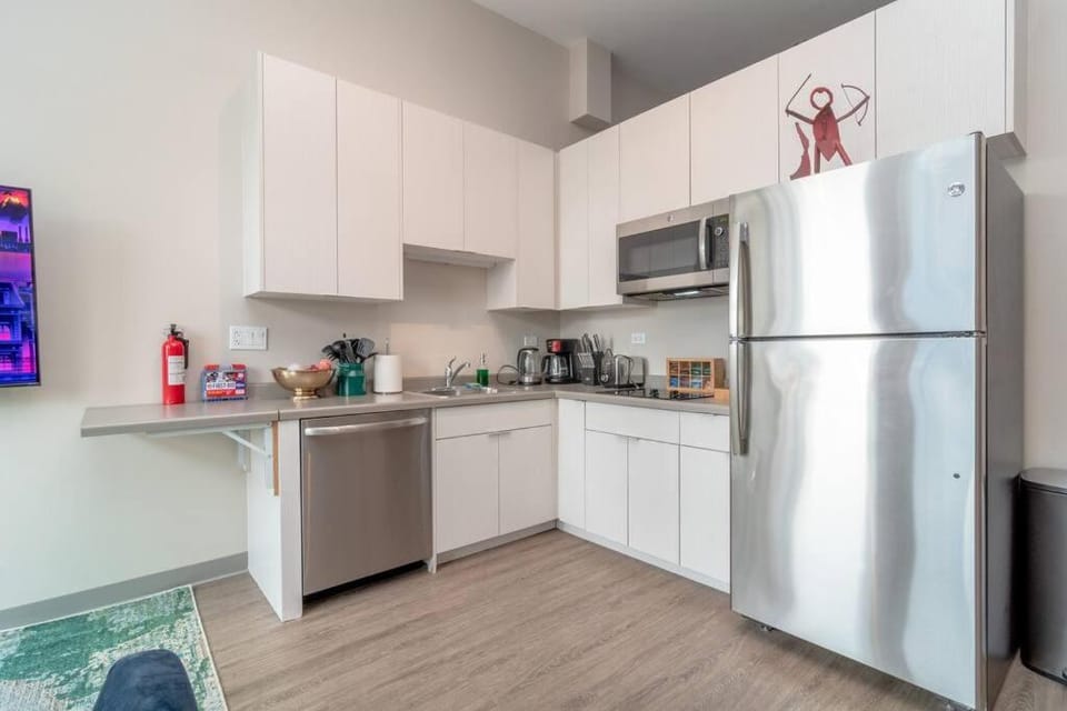 Kitchen or kitchenette, dishwasher, stove, toaster
