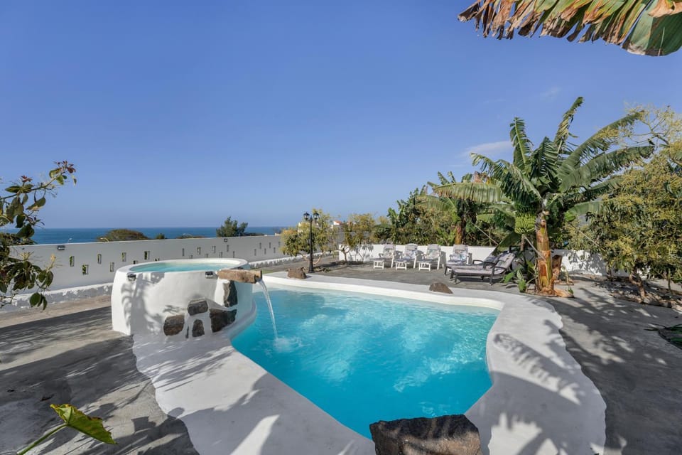 Property building, Living room, Swimming pool