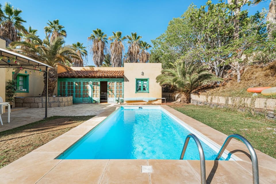 Property building, Living room, Swimming pool