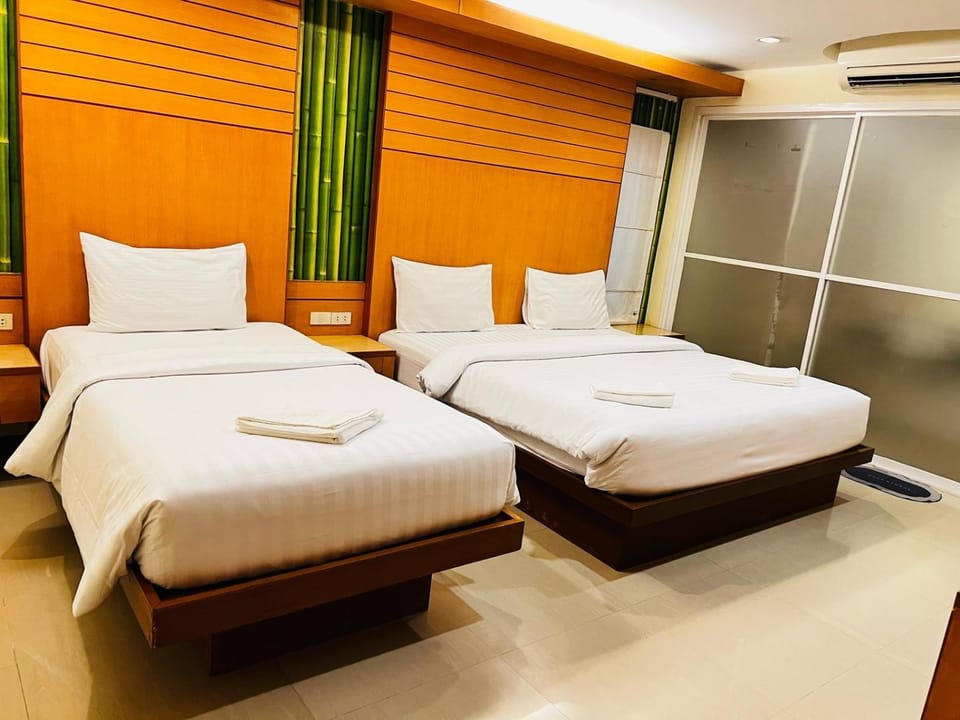 Bed, Photo of the whole room, Bedroom, towels, air conditioner