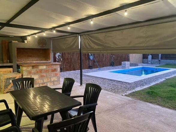 Patio, Day, Dining area, Pool view, Swimming pool