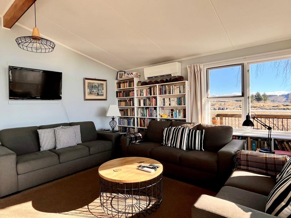 TV and multimedia, Living room, Seating area, Lake view, Mountain view