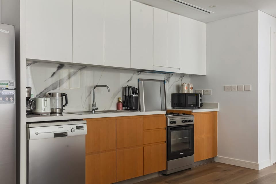 Kitchen or kitchenette, dishwasher, oven, stove, toaster