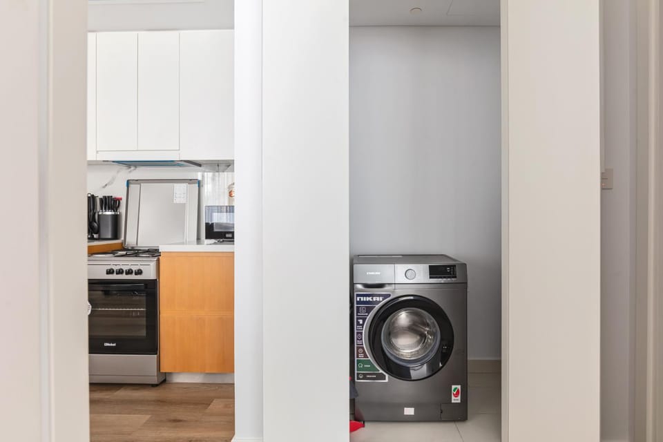 Kitchen or kitchenette, washing machine