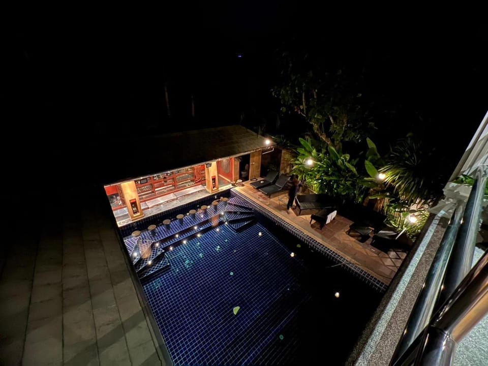Night, Pool view, Swimming pool, sunbed