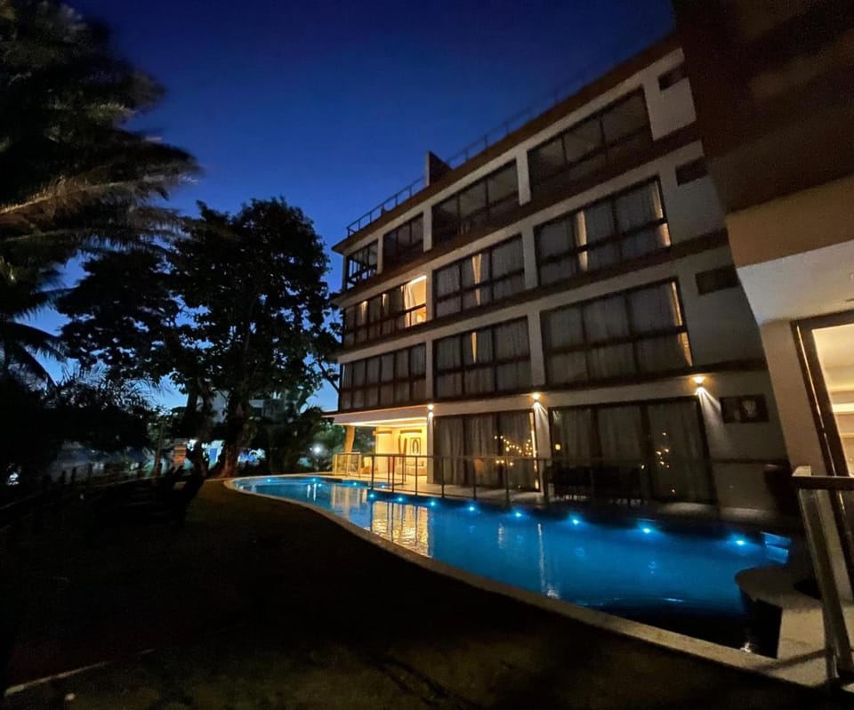 Property building, Night, Pool view, Swimming pool