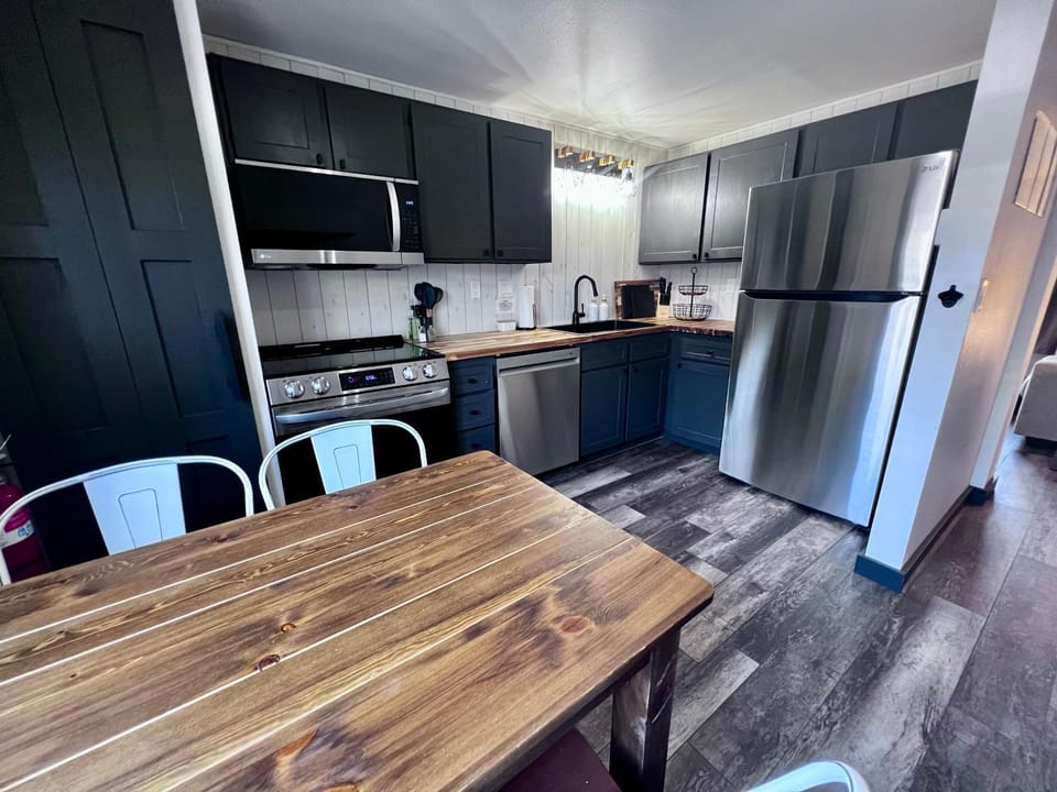 Kitchen or kitchenette, Dining area, dishwasher, oven, stove, toaster