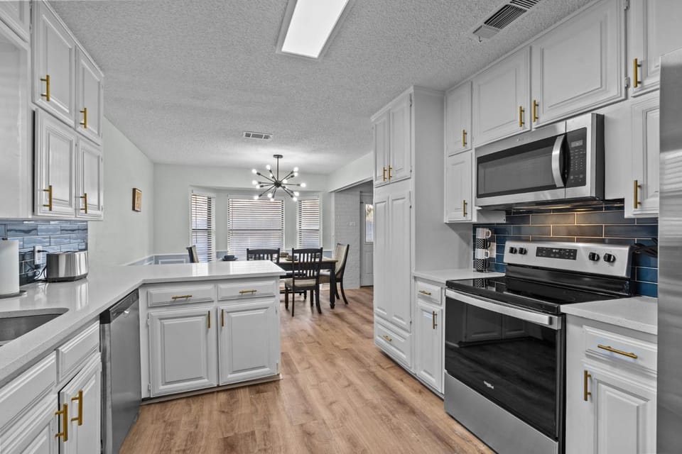 Kitchen or kitchenette, Dining area, dishwasher, oven, stove, toaster