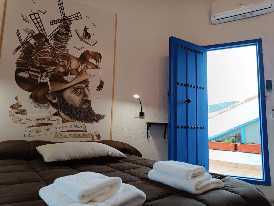 Photo of the whole room, Bedroom, towels, air conditioner