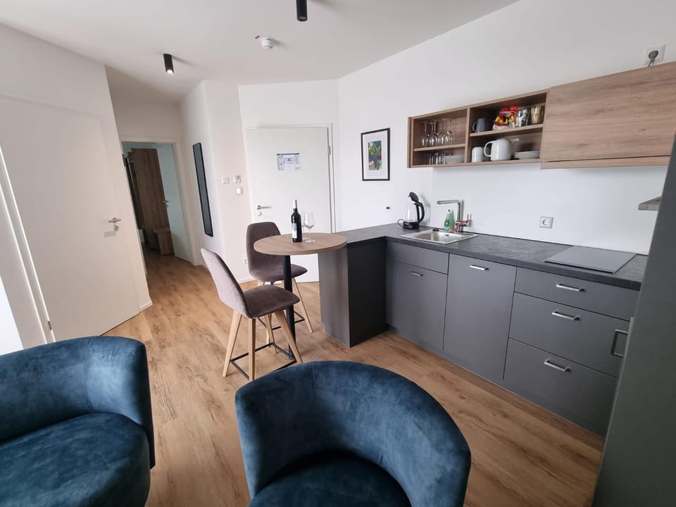 Kitchen or kitchenette, Living room, Dining area, stove