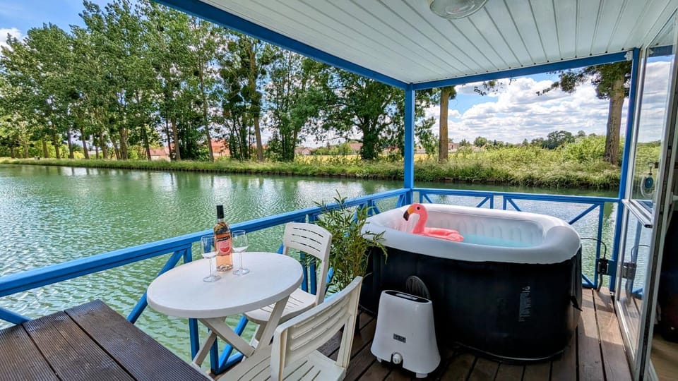 Property building, Patio, Patio, Natural landscape, Hot Tub, Hot Tub, View (from property/room), Balcony/Terrace, Balcony/Terrace, Spa and wellness centre/facilities, Spa and wellness centre/facilities, River view, Swimming pool, Entertainment, Entertainment