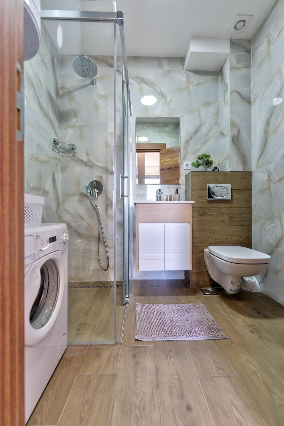 Shower, Toilet, Bathroom, bidet, towels, washing machine
