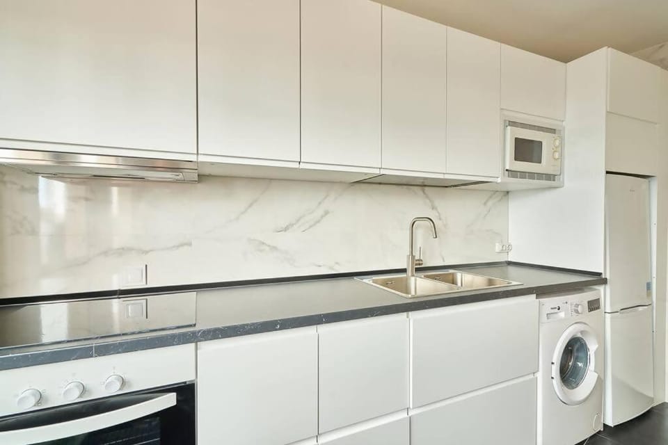 Kitchen or kitchenette, washing machine
