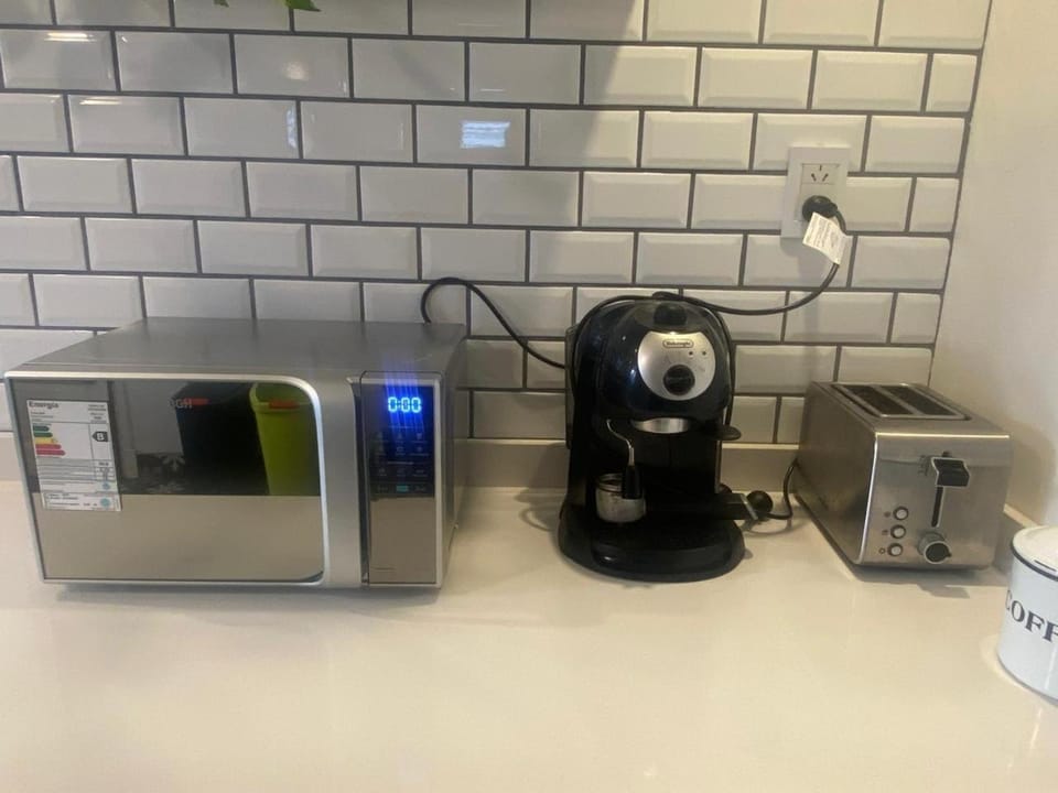Kitchen or kitchenette, microwave