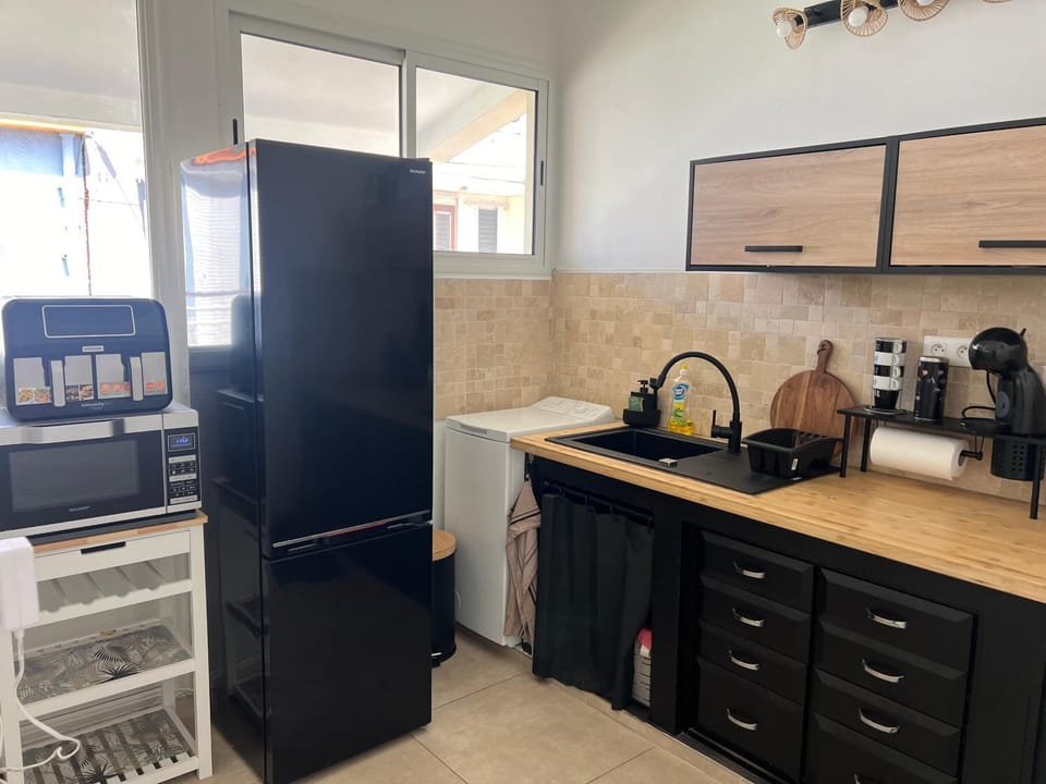Kitchen or kitchenette, oven, stove, toaster