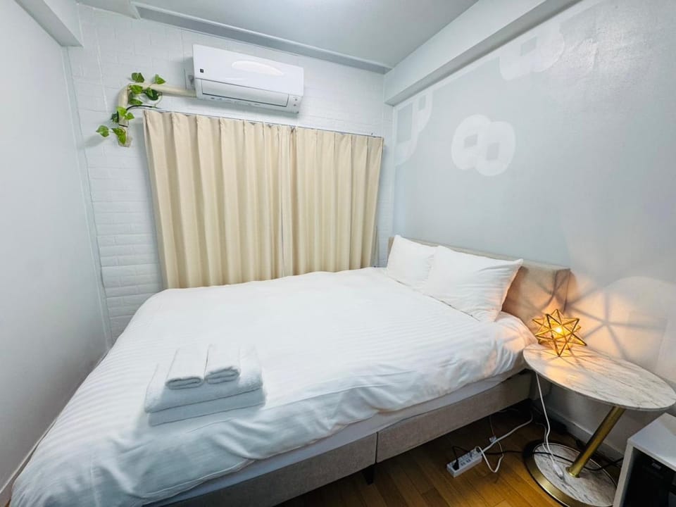 Bed, Photo of the whole room, Bedroom, towels, air conditioner