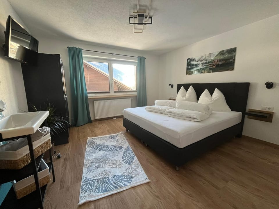 Bedroom, hair dryier, towels