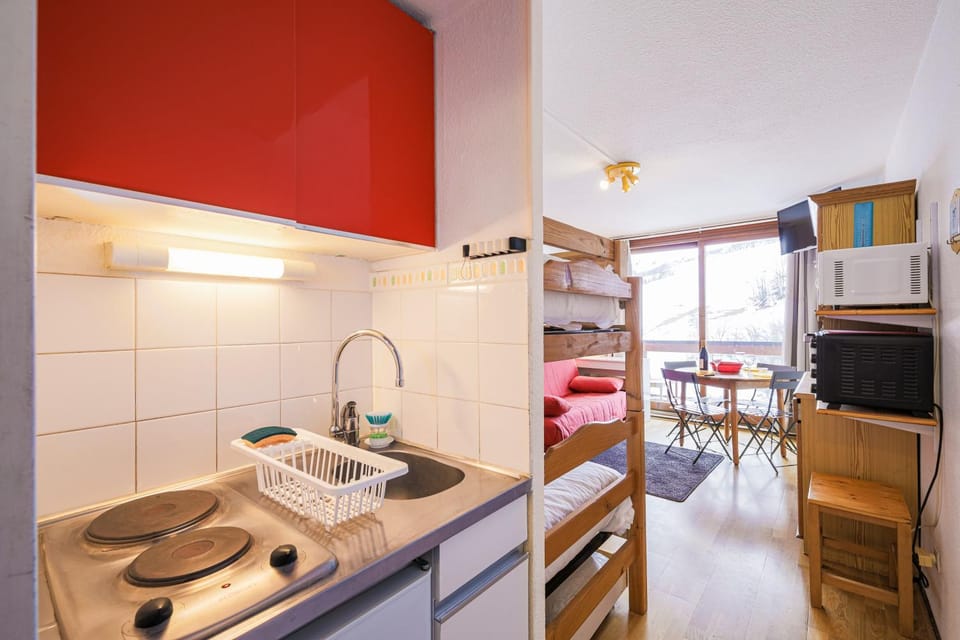 Kitchen or kitchenette, stove