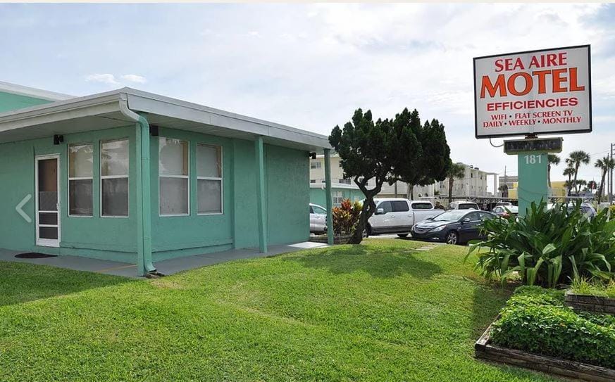 Property building, Text overlay, Street view, Location, Parking