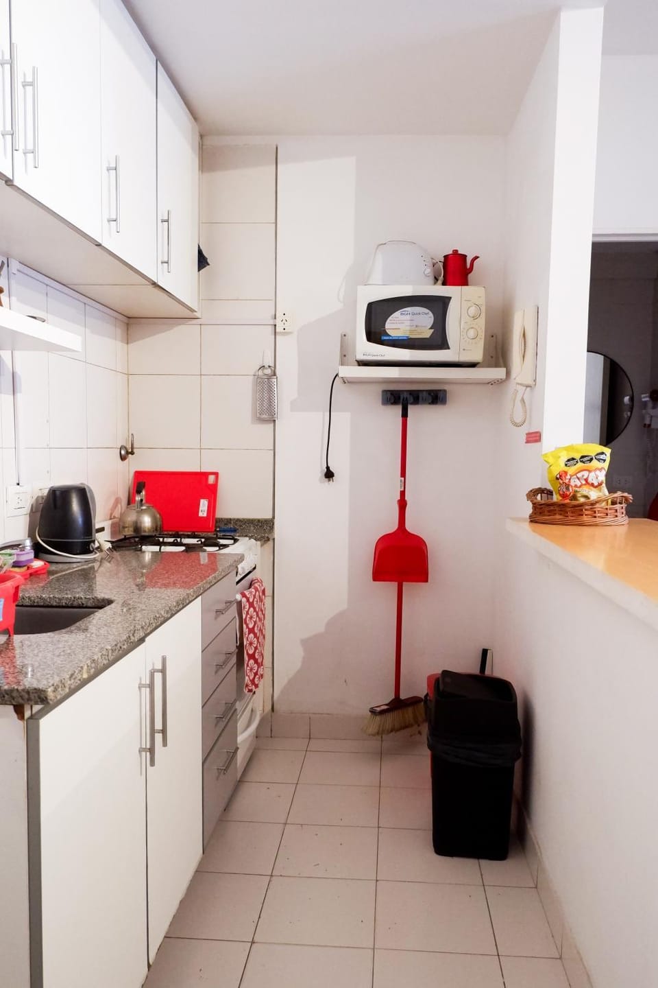 Kitchen or kitchenette, oven, stove, toaster