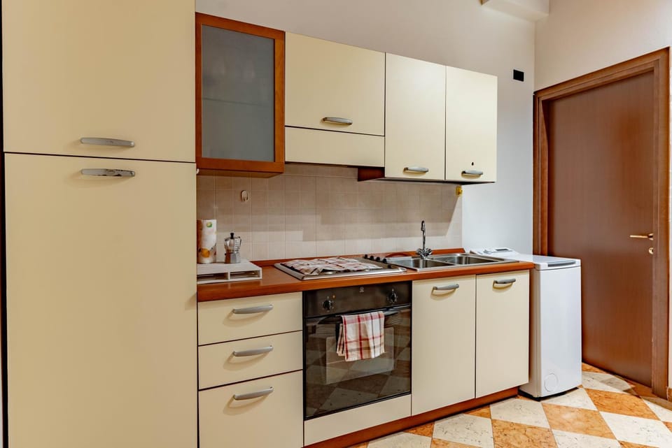 Kitchen or kitchenette, oven, stove