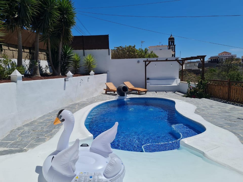Property building, Living room, Swimming pool
