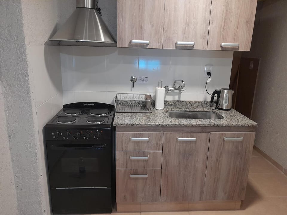 Kitchen or kitchenette, stove