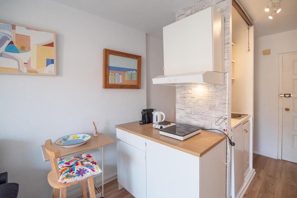 Kitchen or kitchenette, stove