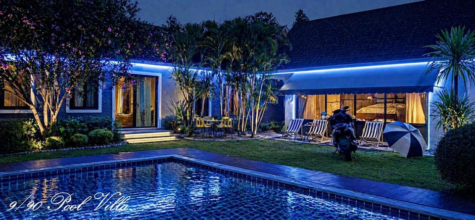 Property building, Patio, Night, Natural landscape, Garden, Garden view, Pool view, Swimming pool