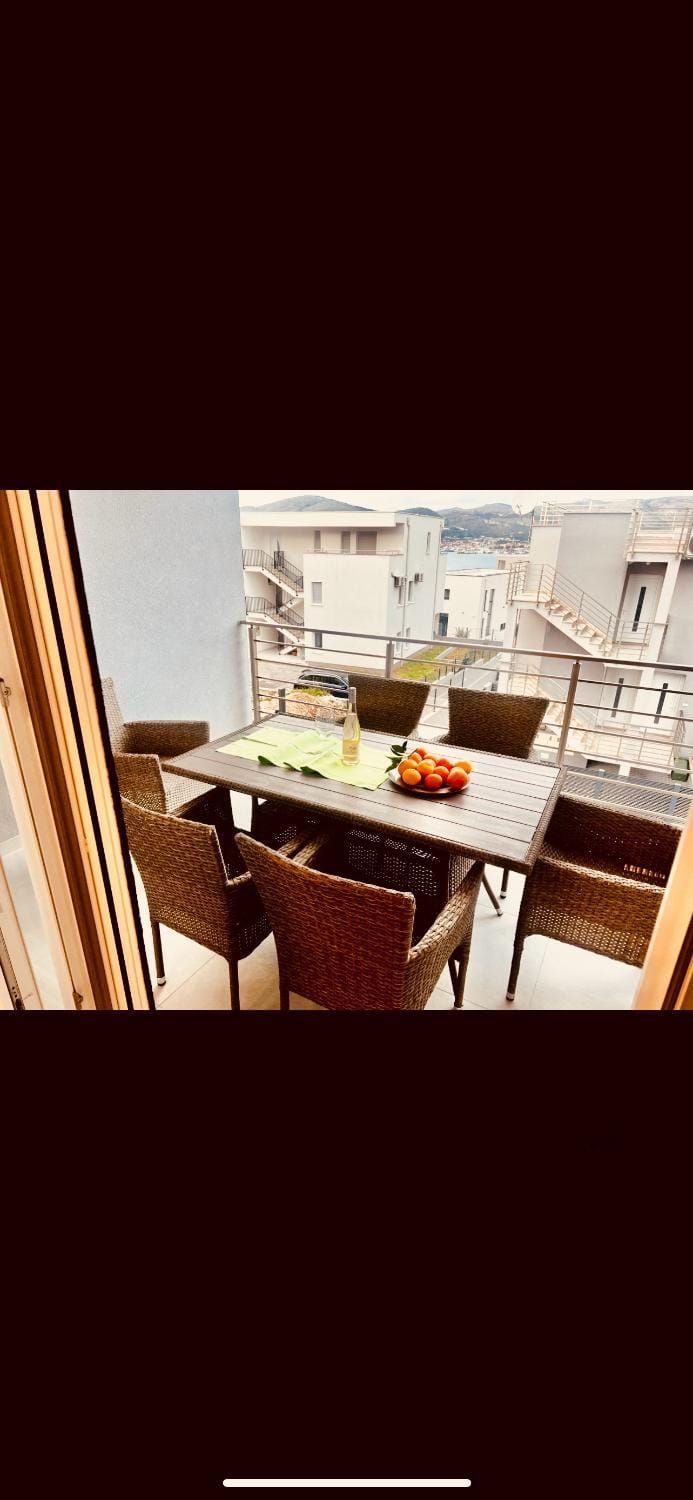 View (from property/room), Balcony/Terrace, Living room, Seating area, Dining area, Food, Pool view