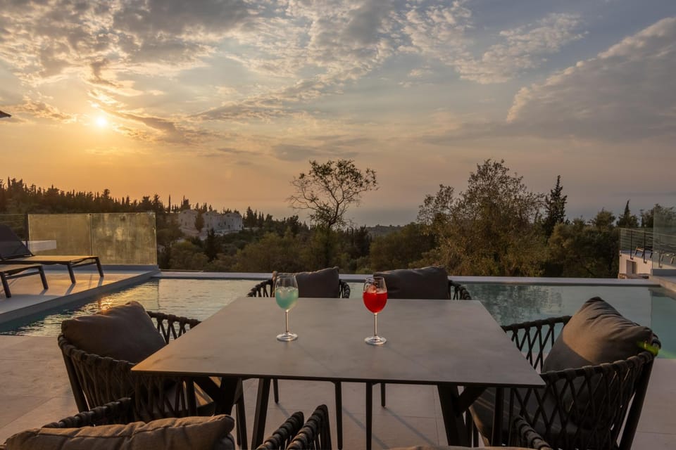 View (from property/room), Balcony/Terrace, Dining area, Pool view, Sunset