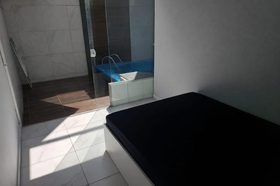 Apto Térreo Privativo com Piscina Ar condicionado e vaga de estacionamento em Itapema Apartment in Porto Belo