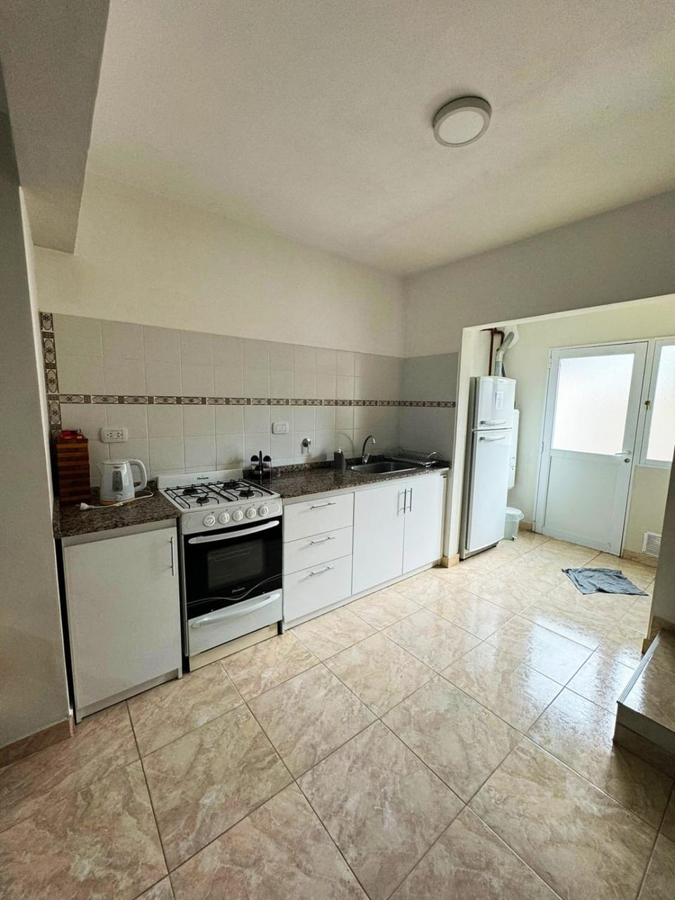 Kitchen or kitchenette, oven, stove