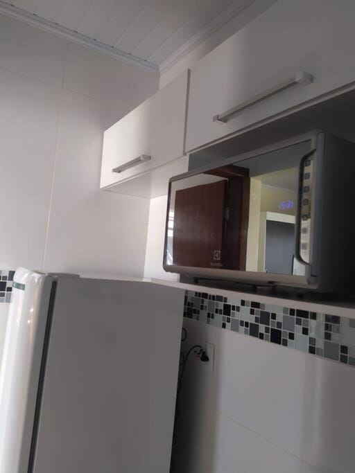 Kitchen or kitchenette, minibar