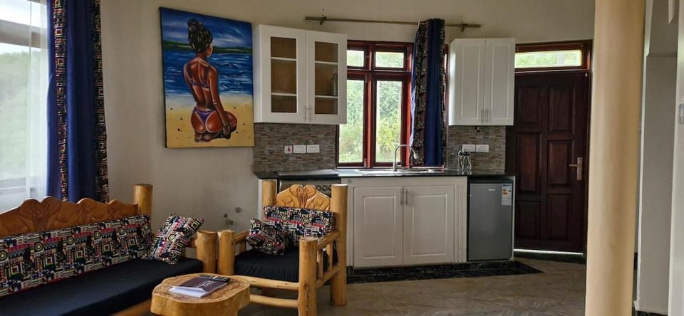 Kitchen or kitchenette, Living room, Seating area, Dining area, stove