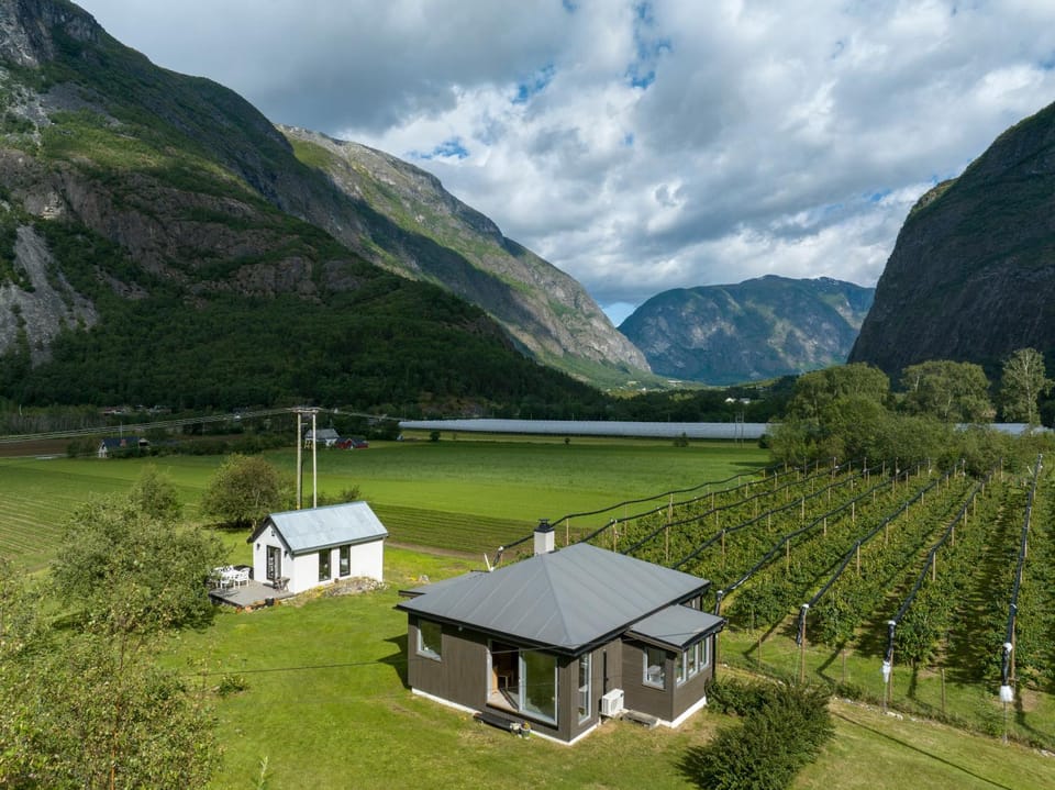 Property building, Nearby landmark, Natural landscape, Mountain view