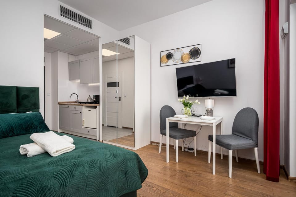 Bed, Kitchen or kitchenette, towels, air conditioner