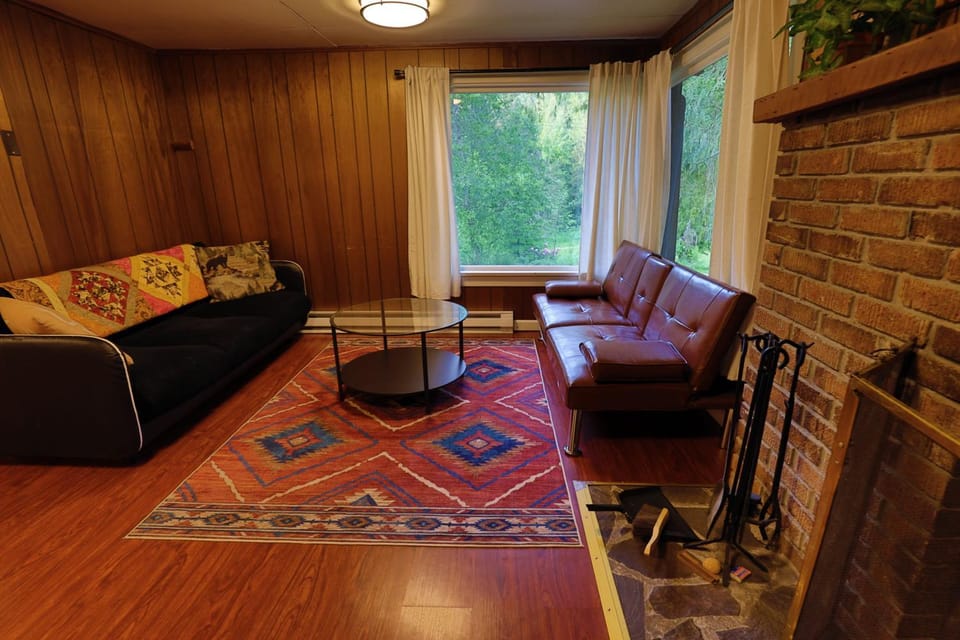 Natural landscape, View (from property/room), Living room, Seating area, fireplace