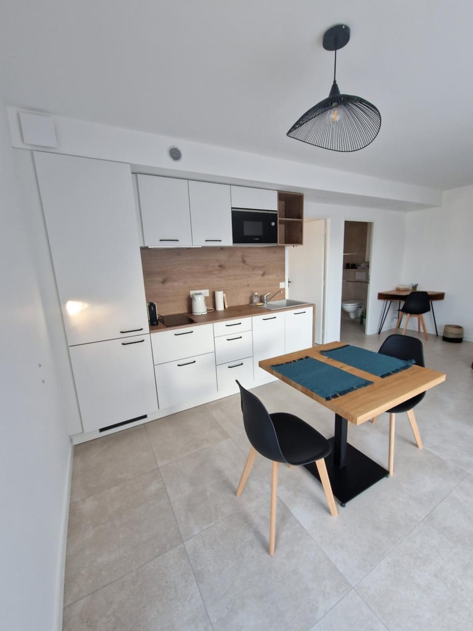 Dining area, dishwasher, oven, stove, kitchen
