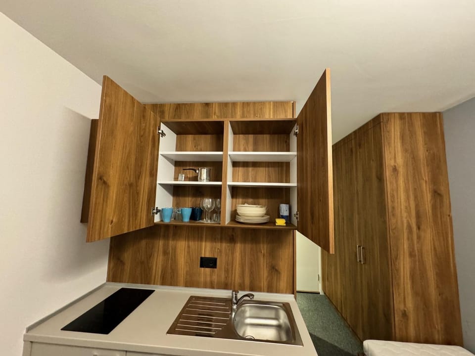 Kitchen or kitchenette, stove