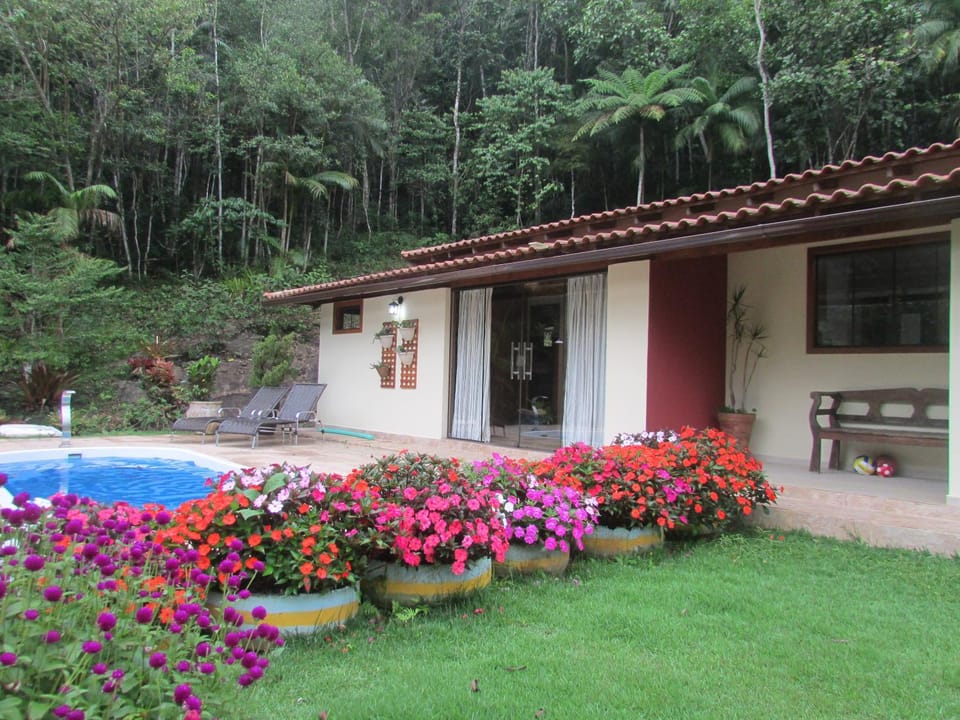 Property building, Patio, Spring, Garden, Garden view, Pool view, Swimming pool