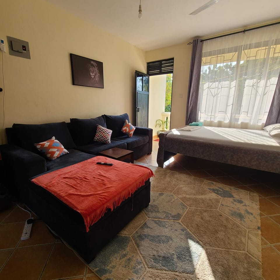 Bed, Living room, Seating area, Bedroom