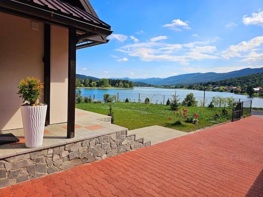 Property building, Day, Natural landscape, Lake view