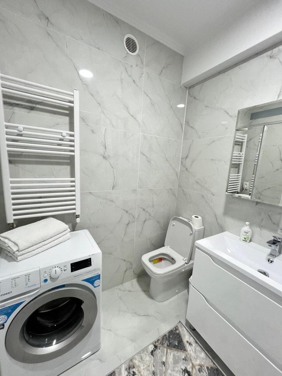 Toilet, Bathroom, towels, washing machine, dryer