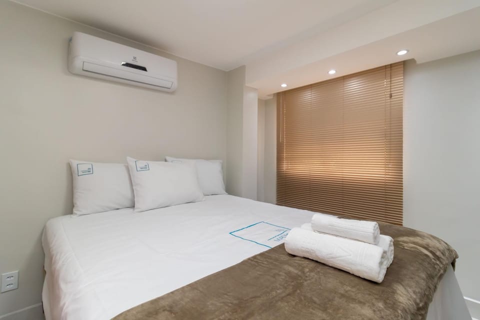 Bed, Photo of the whole room, Bedroom, towels, air conditioner