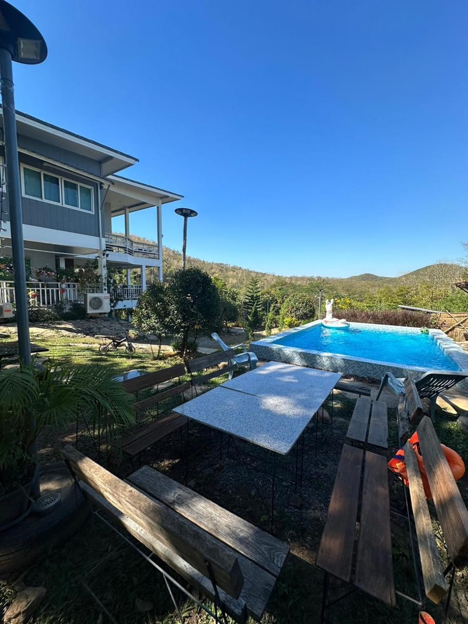 Property building, Day, Natural landscape, Mountain view, Pool view, Swimming pool, sunbed