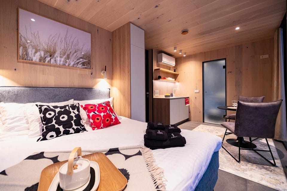 Bed, Living room, Seating area, Bedroom
