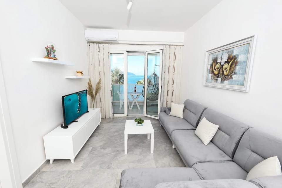 TV and multimedia, Living room, Seating area, Sea view, air conditioner